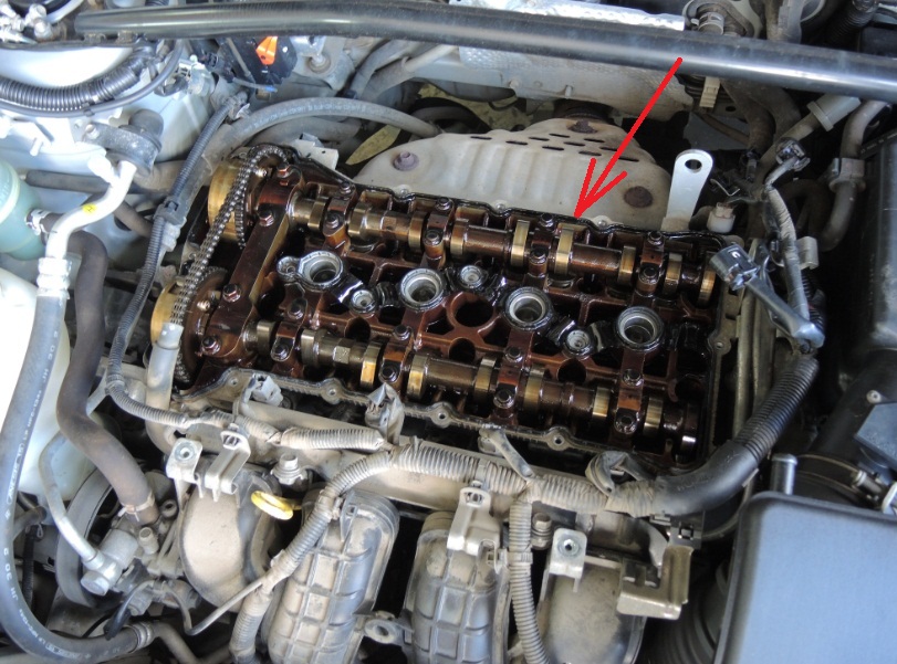Размещение прокладки крышки головки блока цилиндров двигателей 4B12 и 4B11 Mitsubishi Outlander XL