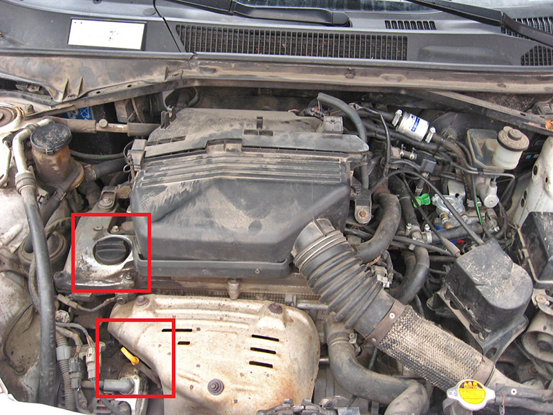 Расположение маслоизмерительного щупа и наливной горловины двигателя Toyota RAV4 CA20W