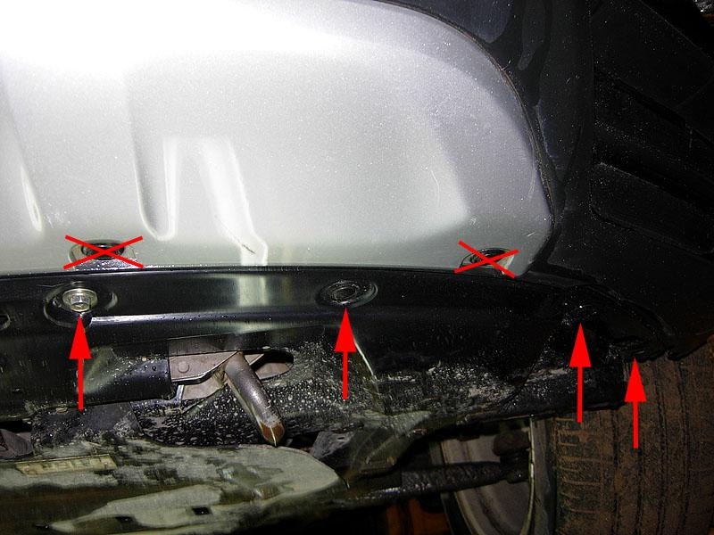 Размещение элементов крепления левой части пыльника двигателя к переднему бамперу Mitsubishi Outlander XL