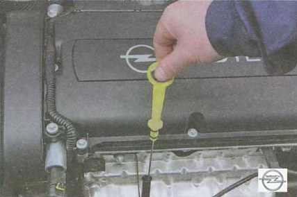 Вынимание щупа Opel Astra