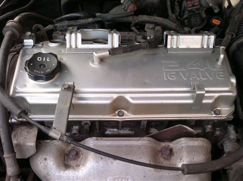 Двигатель с извлеченными катушками зажигания Mitsubishi Outlander I 2003 - 2008