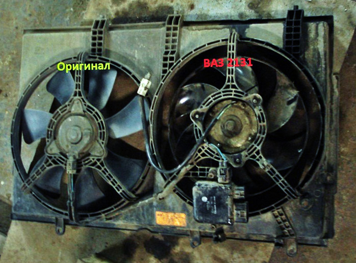 Сменный вентилятор от ВАЗ 2131 в рамке вентиляторов радиатора Mitsubishi Outlander I 2003 - 2008