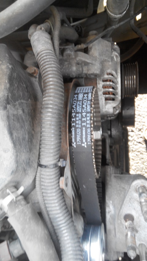 Установленный ремень привода газораспределительного механизма на двигатель 6B31 Mitsubishi Outlander XL
