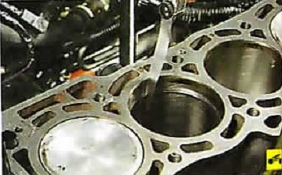 Измерение зазоров в замках колец поршня Nissan Almera Classic