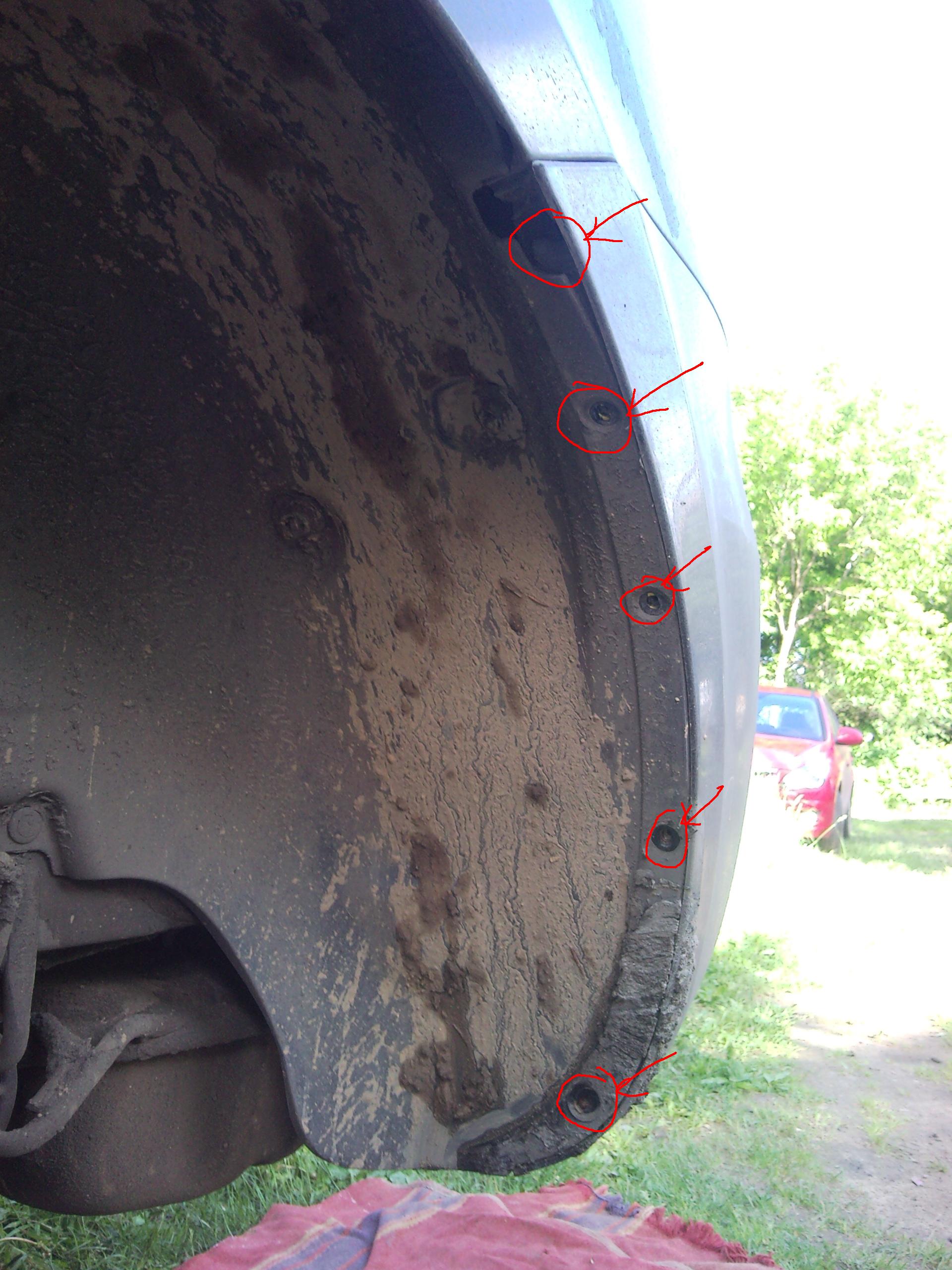 Расположение крепления заднего бампера в арке колеса на автомобиле Hyundai Santa Fe CM 2006-2012