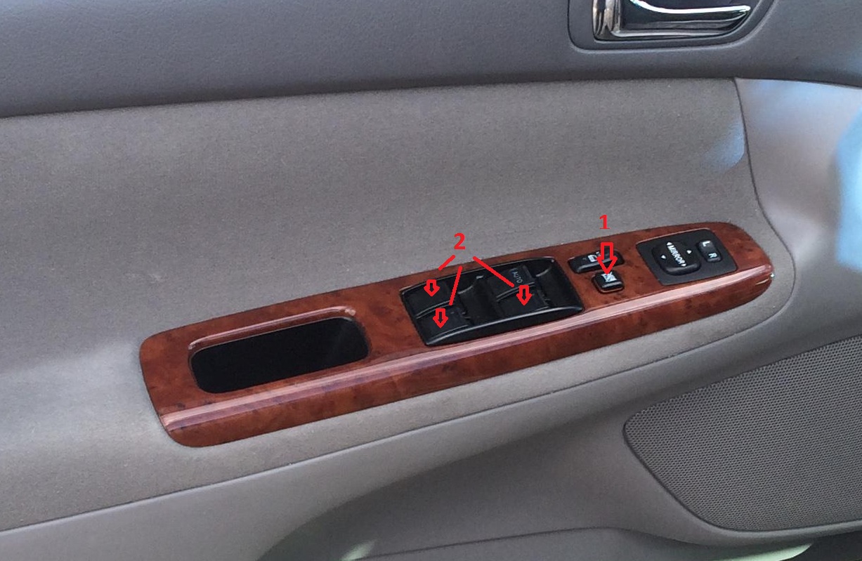 Кнопки управления стеклоподъемниками дверей пассажиров Toyota Camry