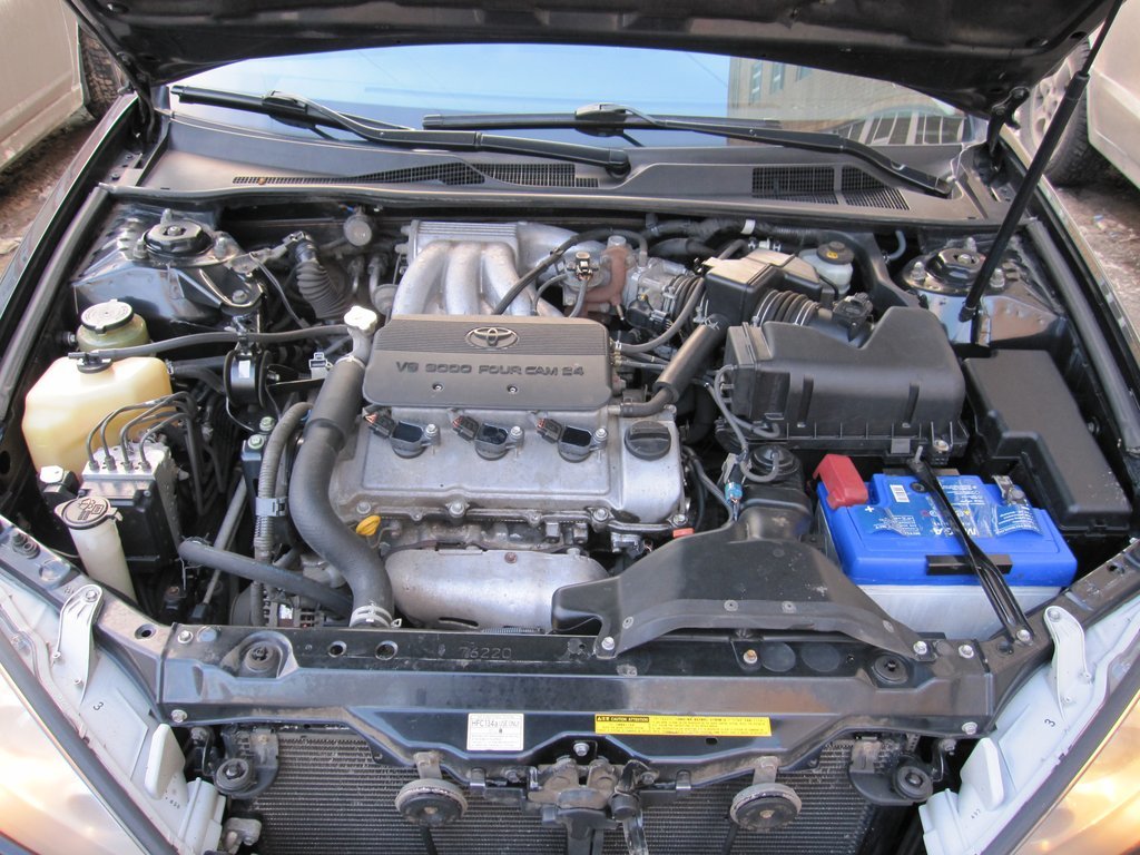 Процесс снятия радиатора Toyota Camry 