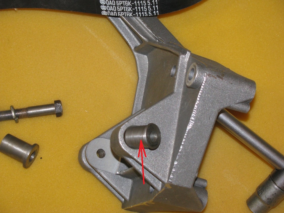 Placement of the spacer sleeve in the lower left mount of the Lada Grant generator (VAZ 2190)