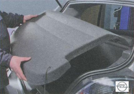Снятие полки багажника на автомобиле Opel Astra