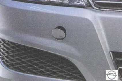 Открывание передней заглушки в бампере  на автомобиле Opel Astra